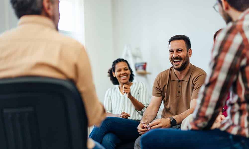 Coed group therapy session during drug and alcohol rehab in Everett, MA