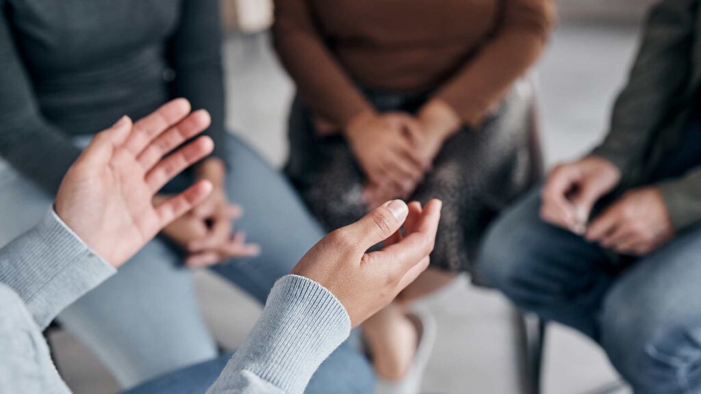 Group therapy session focused on evidence-based addiction treatment and recovery support.