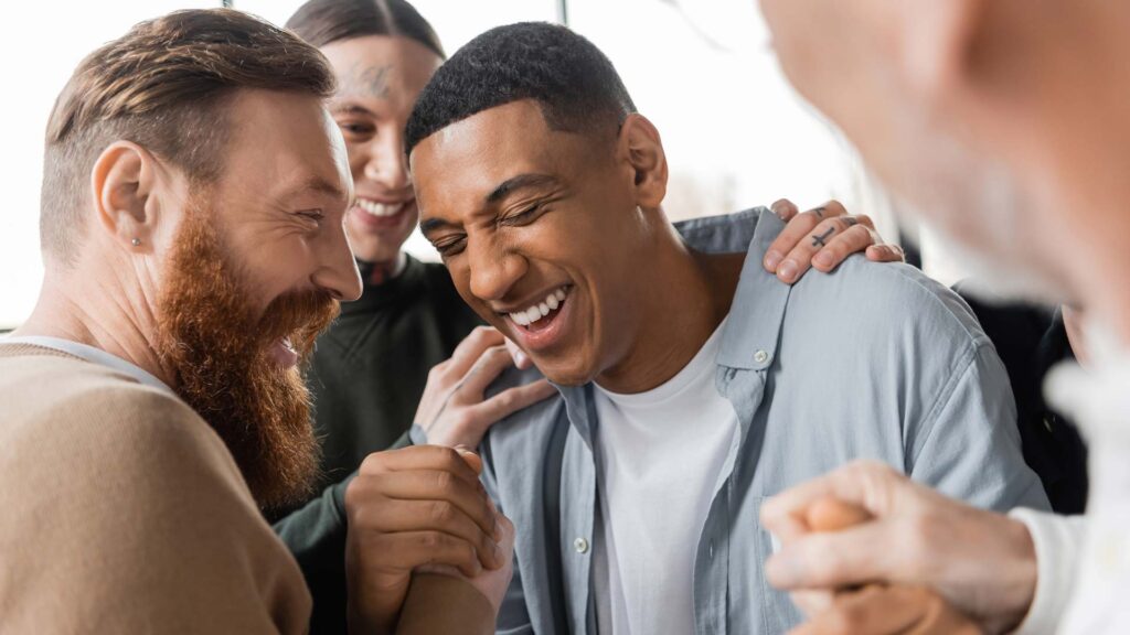 People supporting one another during outpatient addiction treatment as part of long-term recovery.